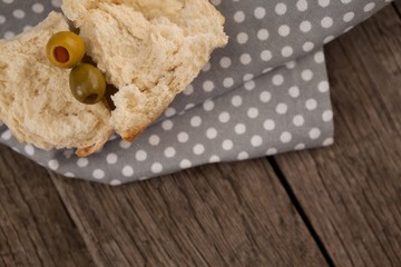 High angle view of olives with bread