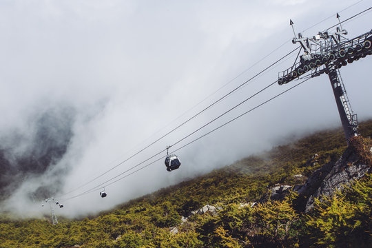 Take the cable car into the clouds