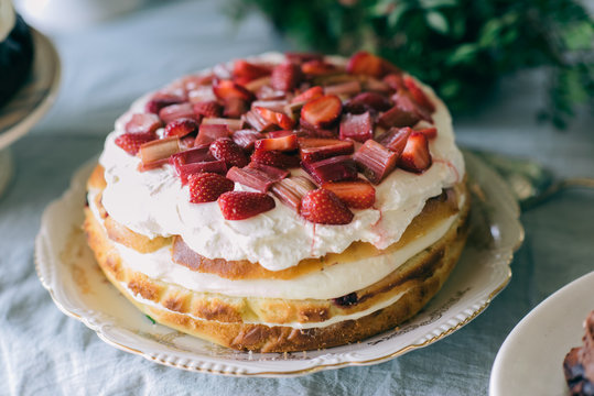 Cake with rhubarb and strawberries