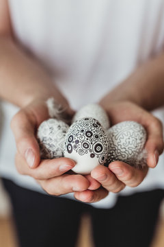 Man holding Easter eggs