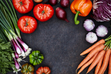 Fresh seasonal vegetables on dark rusty table