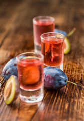 Portion of Plum Liqueur, selective focus