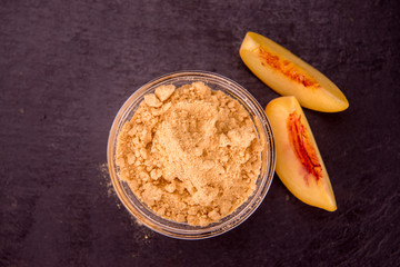 Portion of Ground Peaches on a slate slab