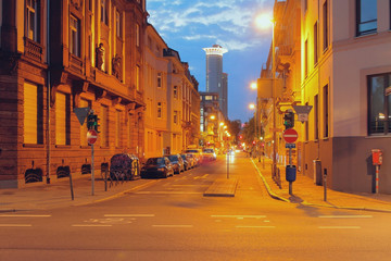 Intersection and street in night city. Frankfurt am Main, Germany
