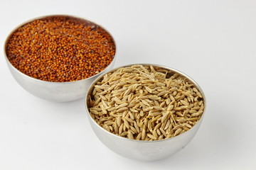 Cumin and Mustard seeds on white background