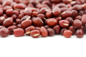 close up of red bean on white background