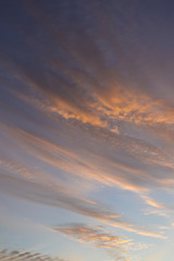 Fototapeta premium Beautiful clouds at sunrise, improbable sky