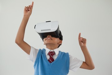 Schoolboy using virtual reality headset