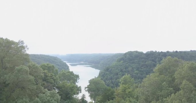Ascending over river home