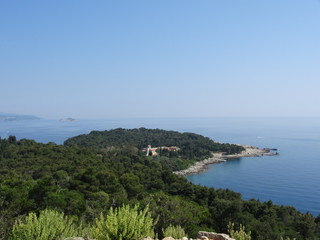 Partial aerial view of the end of Lokrum Island and its rocky coast in Dubrovnik in Croatia.