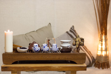 Table for traditional chinese ceremony with candle.