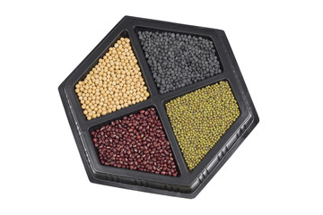 Different colorful beans in container, soybeans, black beans, mung beans and red beans.
