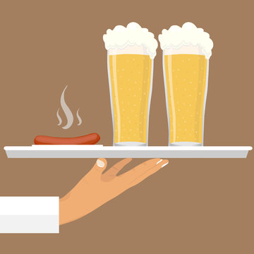 A Glass Of Beer With A Sausage On A Tray