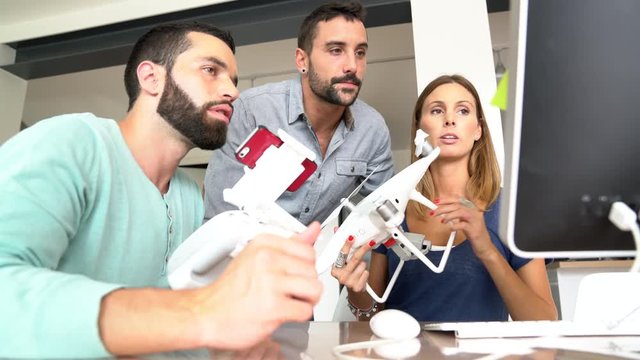 Startup people in office working on drone technology