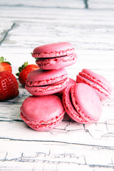 Sweet and colourful french macaroons or macaron with strawberry