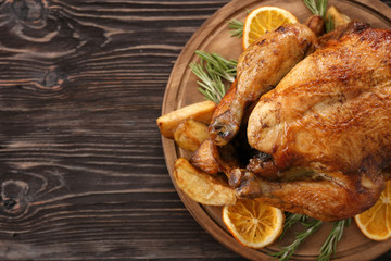 Roasted turkey on wooden board