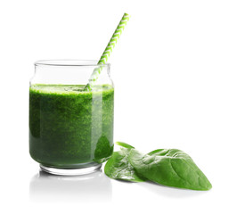 Glass of spinach smoothie isolated on white