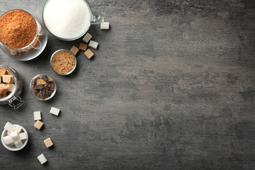 Various kinds of sugar on grey table