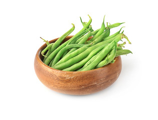 Bowl with fresh green beans on white background