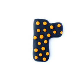 3d black and orange dotted text word letter R isolated on white background. Cute halloween cartoon figures handmade handicraft for clay plastiline	