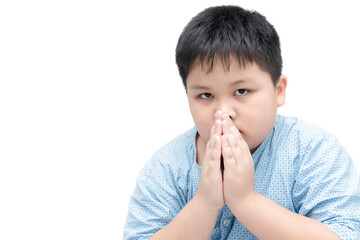 Little asian boy spiritual peaceful praying isolated