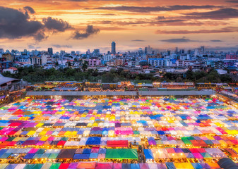 Colorful Train night market in Bangkok is new landmark for shopping at night. - obrazy, fototapety, plakaty