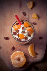 Fresh fruit mandarin yoghurt and raisins