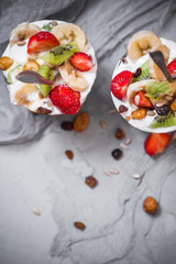 Nutrition Yoghurt fruit dessert strawberries banana kiwi raisins sunflower seeds oatmeal walnuts caramel