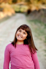 Little preteen girl in park