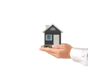 salesman person giving to buyer customer,house in hand