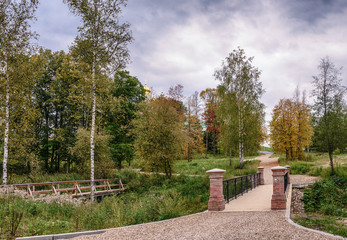 Moscow region. Istra. Autumn. Road through a new brick bridge to the New Jerusalem Monastery of the Resurrection.