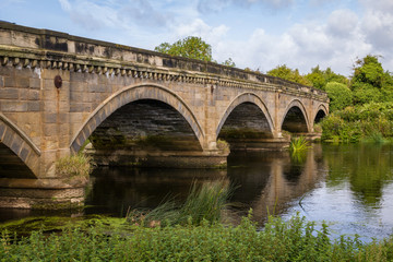 Fototapeta na wymiar Stone Bridge over The River Trent between Repton and Willington