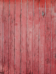 Rustikale Holzwand mit abgeblätterter roter Farbe, Hintergrund