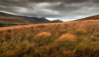 Fototapeta Storm clouds over Pen y Fan and Corn Du, the highest peaks in the Brecon Beacons, South Wales, UK
 obraz