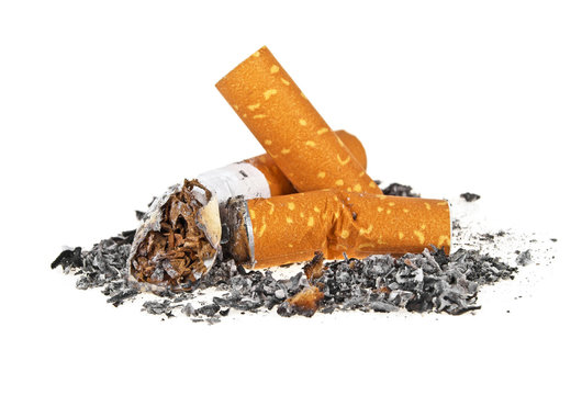 Cigarette butts with ash on a white background