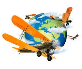 Biplanes flying around the Globe