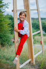 Little boy in Ukrainian embroidered shirt.