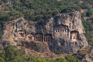 Rocky shores of the river Dalyan in Turkey with ancient Lycian tombs, selective focus