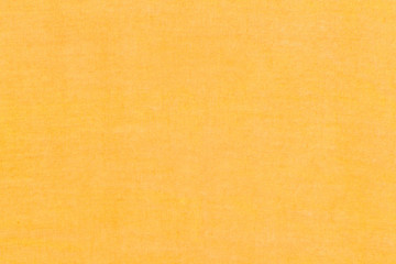 Yellow grunge canvas background. Yellow linen fabric texture. Abstract woven surface.