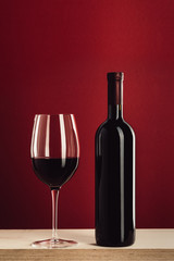 glass and bottle of red wine