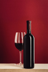 glass and bottle of red wine