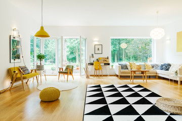 Lamps and poufs in room