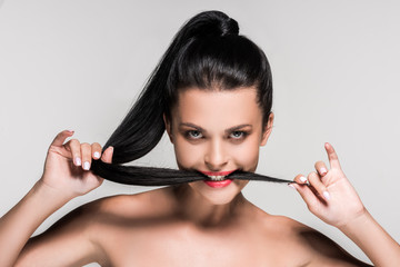 Obraz premium woman with hair in mouth