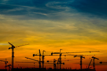 Tower crane construction in the evening light
