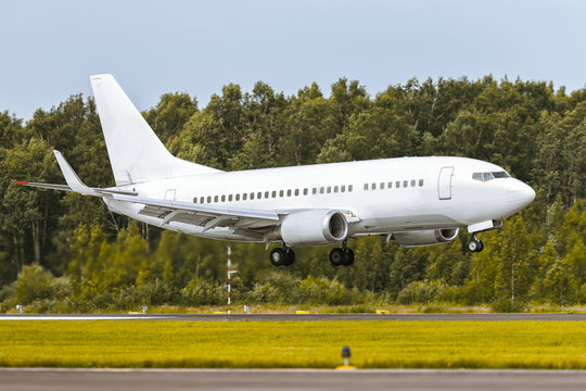 Aircraft is landing on the runway at airport