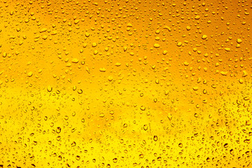 Drops of water on a glass of beer. Background, Texture