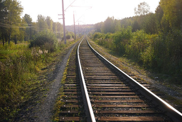 Fototapeta na wymiar Classic railroad goes into the distance. Ekaterinburg, Sverdlovsk oblast, Russia.