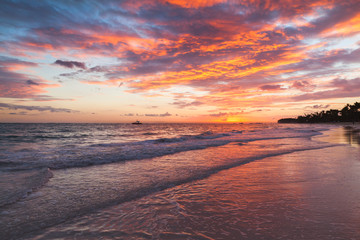 Fototapeta na wymiar Colorful clouds in sunrise over Atlantic Ocean
