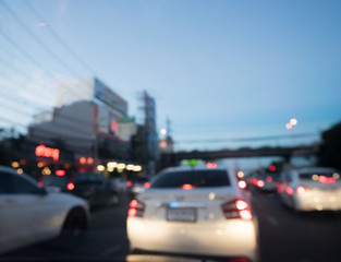 Blurred driving a car on traffic night