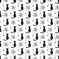 Silhouettes of black cats vector seamless pattern for Halloween